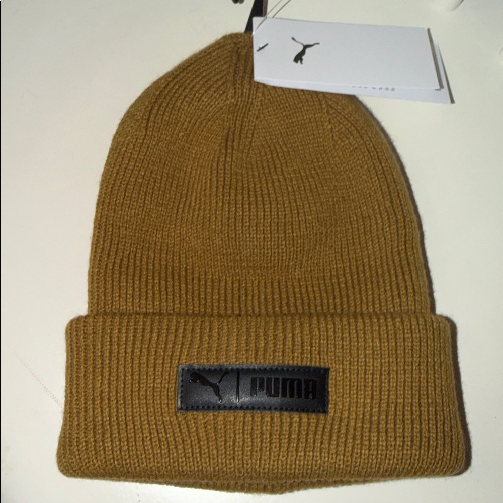 NWT- Puma Golden tan knit beenie w/ leather black log on fold, unique cozy!